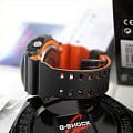 Casio Casio G-Shock GAW-100BR-1A электронные мужские часы часы, крупный план оранжевый циферблат