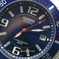 Casio Casio MTD-1053D-2A  японские мужские часы на браслете нержавеющая сталь боковой вид
